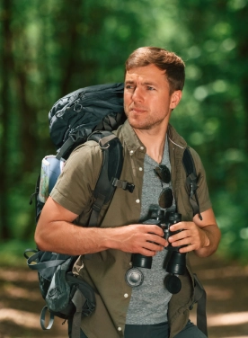 navigation-conception-with-binoculars-tourist.webp